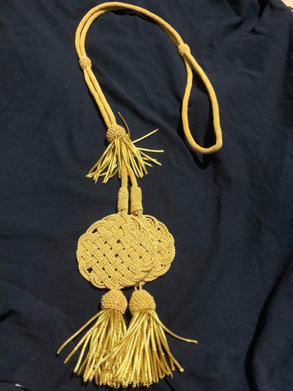 Cord to attach pelisse in ''Trefle'' (1)