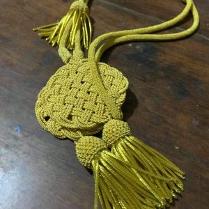 Cord to attach pelisse in ''Trefle'' (1)