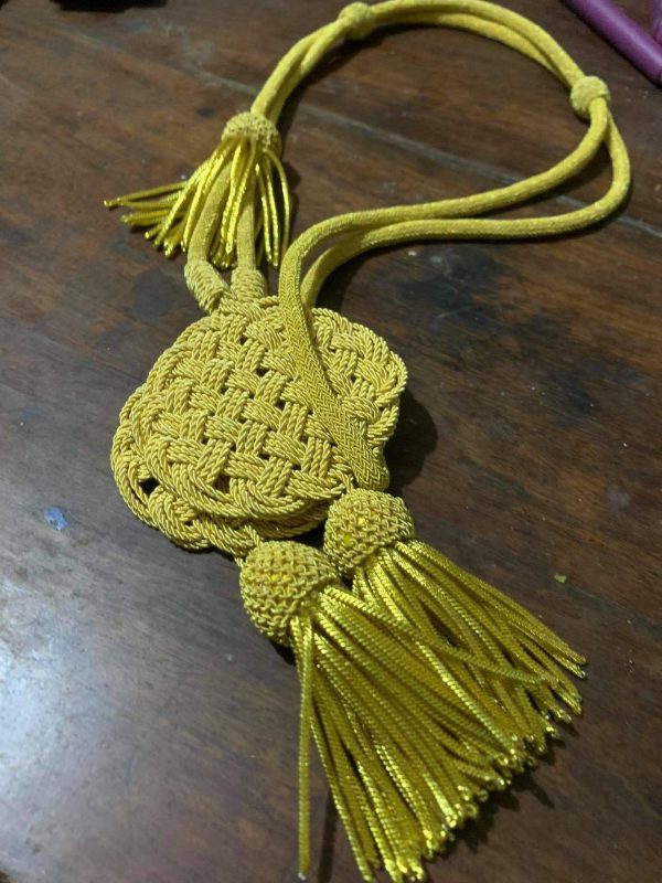 Cord to attach pelisse in ''Trefle'' (1)